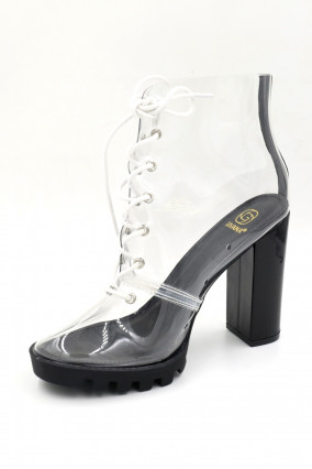 Heeled sandal with rhinestones. Transparent heel.