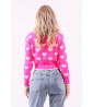 Neon pink cardigan with heart pattern