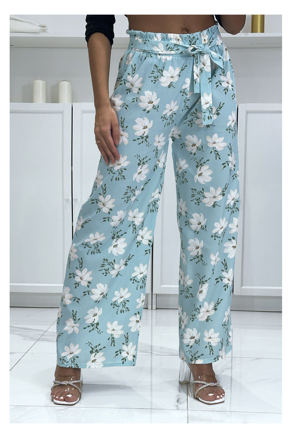 Blue palazzo pants with floral pattern