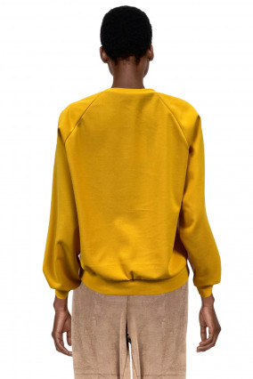 Mustard-colored sweatshirt