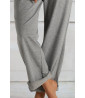 Light gray pants with pockets and tie at the waist