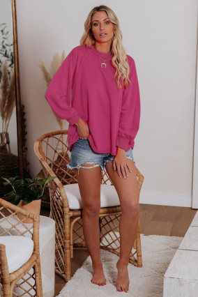 Long-sleeved fuchsia sweatshirt with a dropped shoulder