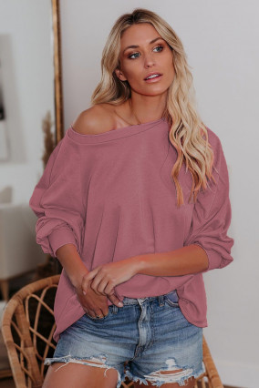 Old pink long-sleeved sweatshirt with one dropped shoulder
