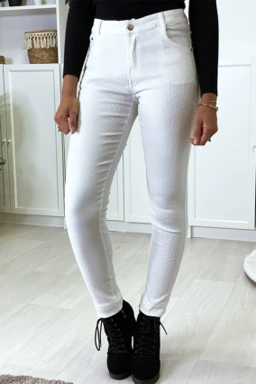 Pantaloni slim bianchi con fantasia pitone